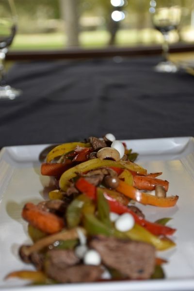 Mixed grill meat platter prepared on charcoal