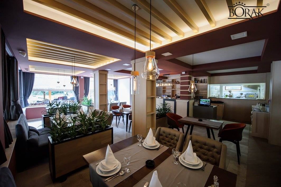 Romantic evening restaurant ambiance by the illuminated river