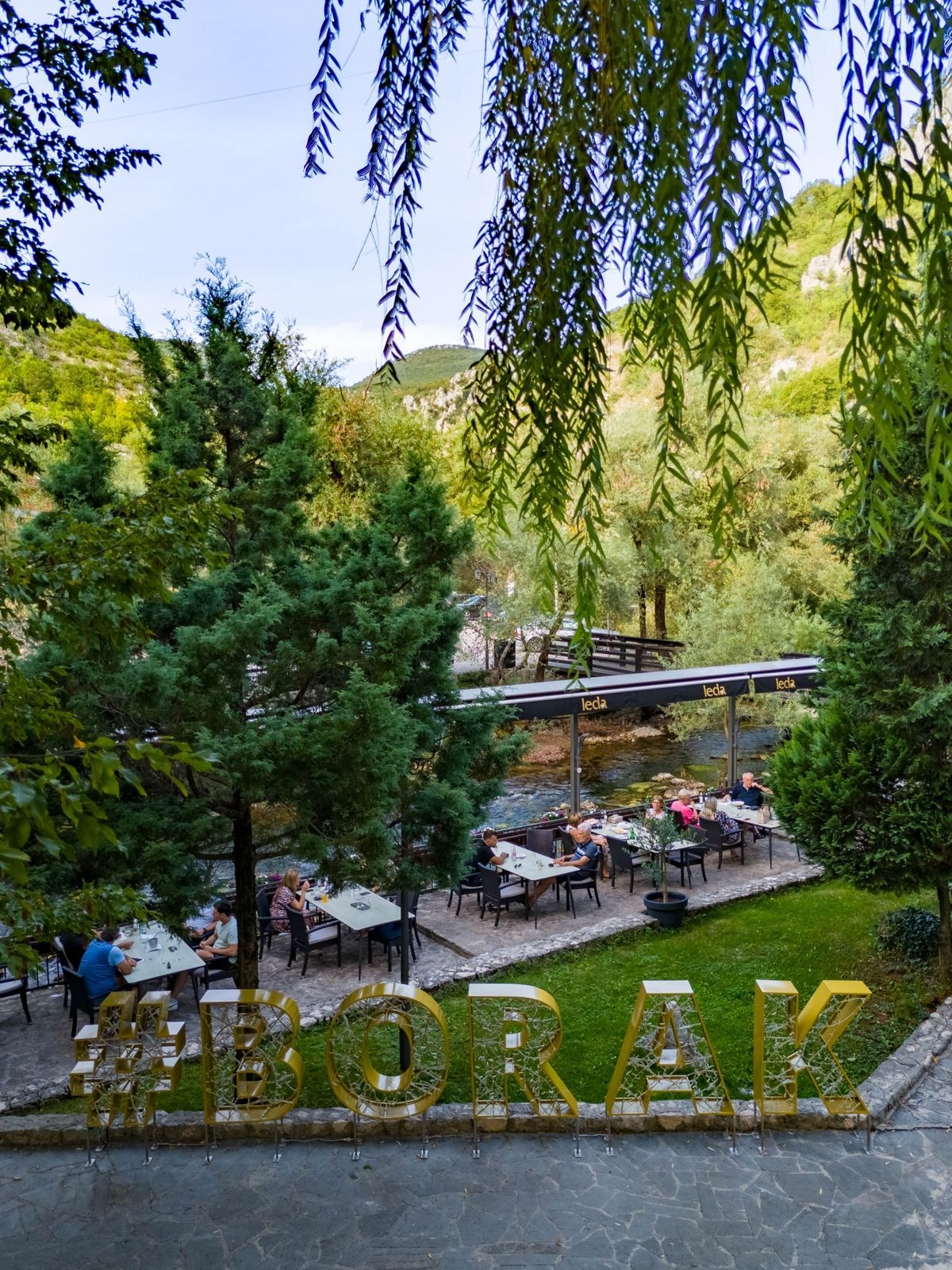 Vrelo Borak spring at the mountain base - a turquoise oasis of peace